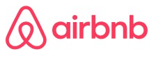 Airbnb logo on the 2026 airbnb.com homepage: the Bélo in Rausch red