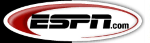 ESPN logo on the 2000 espn.com homepage: black ESPN.com wordmark inside a white oval with a red border (under the GO.com network bar)