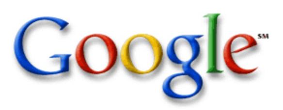 Google logo on the 2000 google.com homepage: new wordmark: exclamation mark and BETA gone, bevelled serif letters with a drop shadow, SM mark