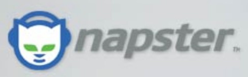 Napster logo on the 2003 napster.com homepage: Blue cat with green eyes beside a grey italic wordmark; the curved marks before the lettering are gone.