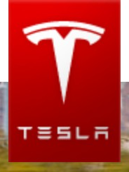 Tesla logo on the 2010 tesla.com homepage: The shield becomes a white T and wordmark on a red badge.