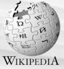 Wikipedia logo on the 2005 wikipedia.org homepage: jigsaw-puzzle globe, wordmark on its base (portal corner)